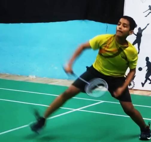Intermediate badminton players training